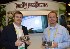 Brenton Helm and Doug LaCroix with Family Tree Farms show clamshells with blueberries from Mexico.
